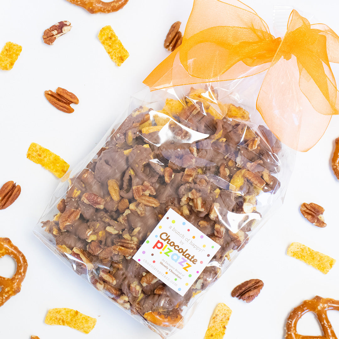 Packaged chocolate covered pretzels with a visible brand label on a white background.