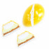 Yellow and white dessert with a bite taken out of it on a white background