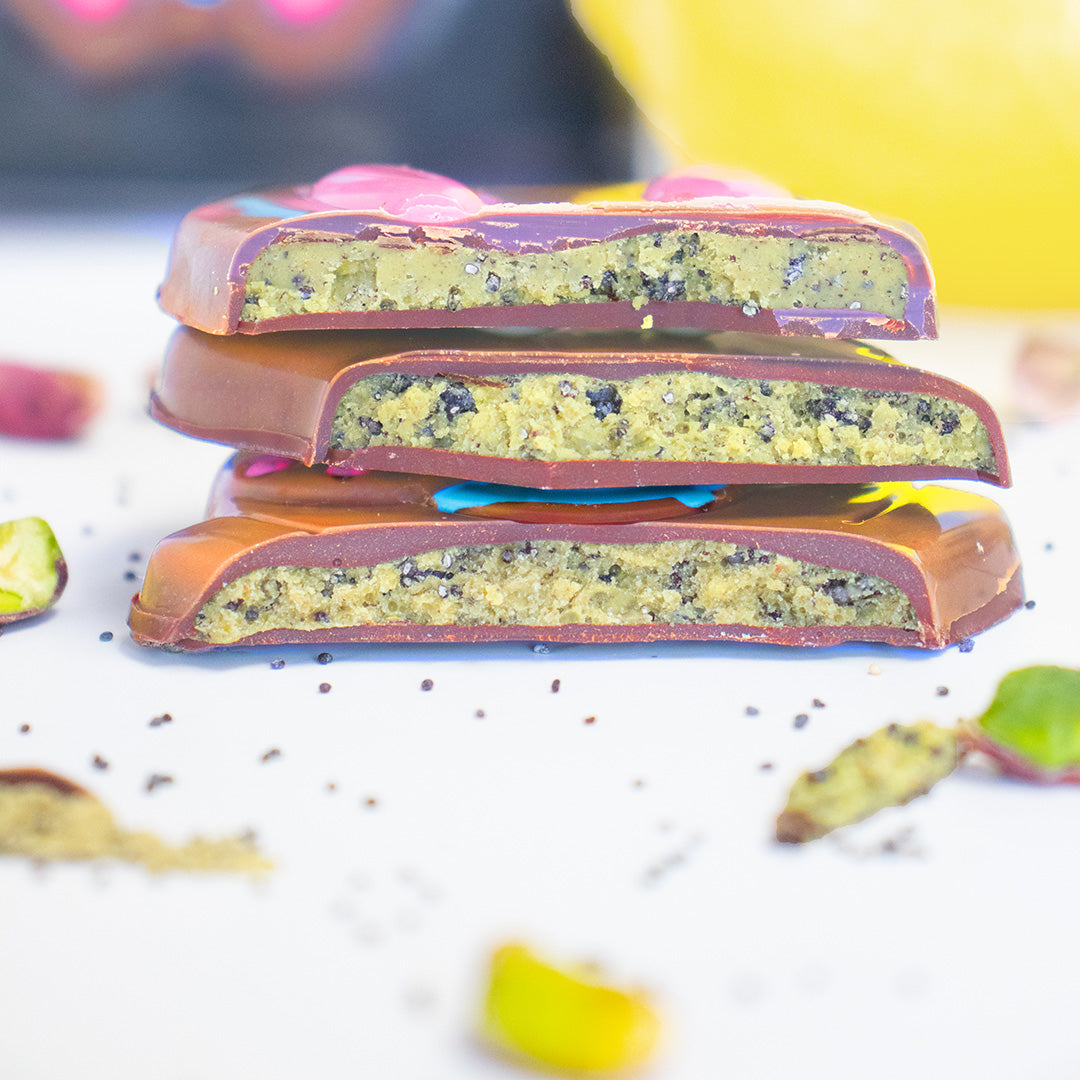Stack of chocolate bars with a close-up of the interior on a light background